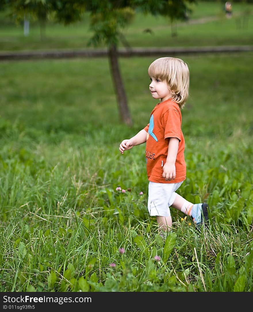 Little boy playing at the park. Little boy playing at the park