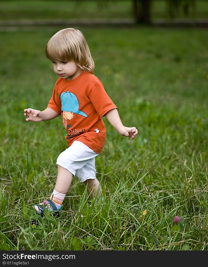 Little boy playing at the park. Little boy playing at the park