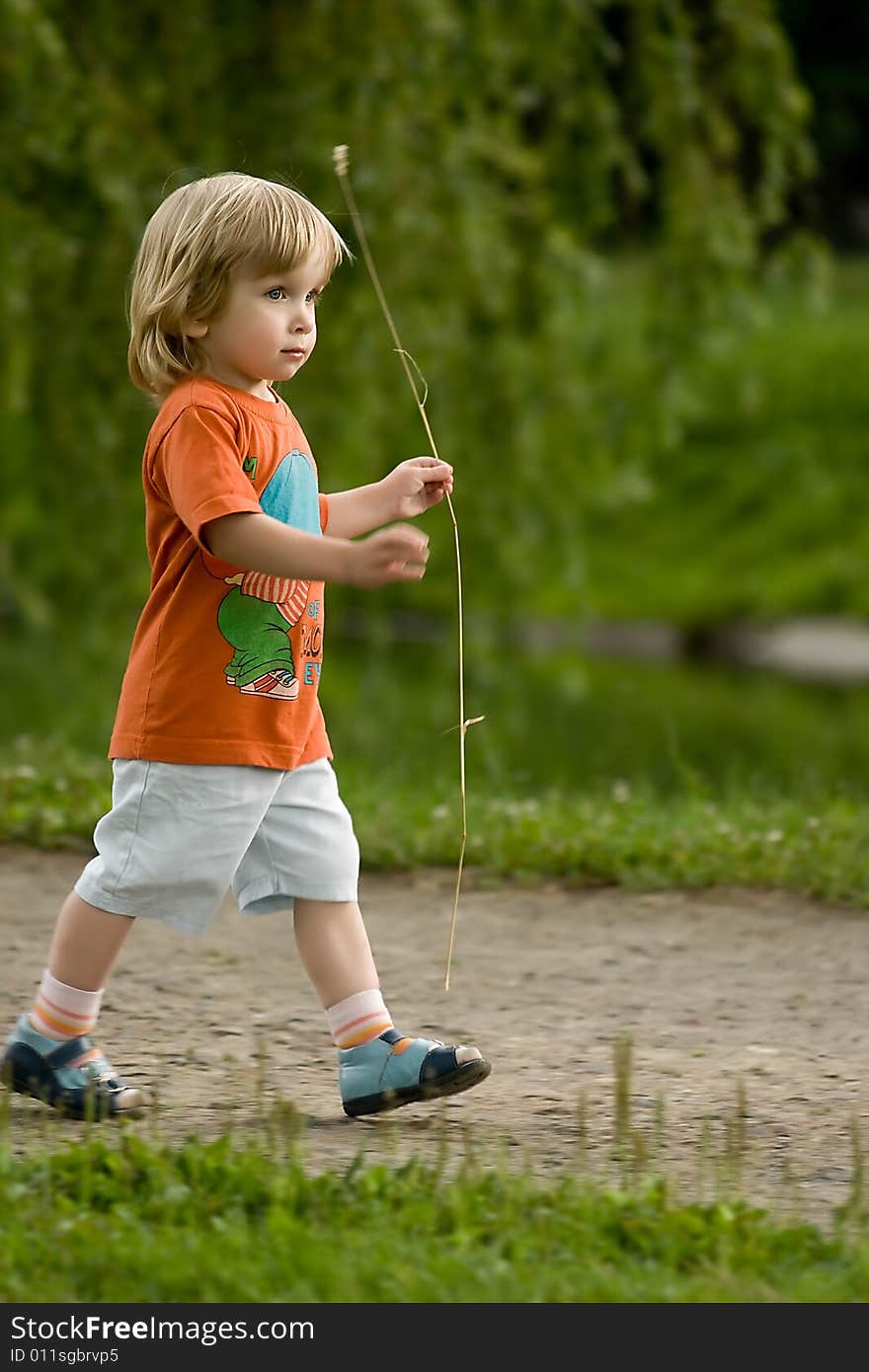 Little boy playing at the park. Little boy playing at the park