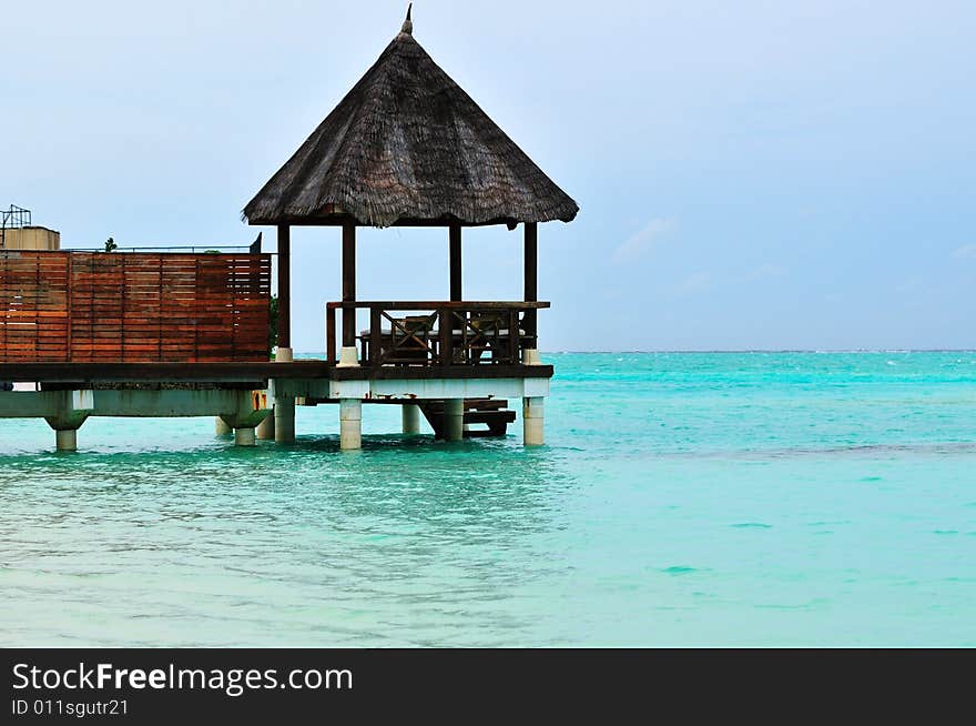 Island of Paradise. White sand beaches with coco-tree and crystal blue water. Maldives. Luxury holidays. Island of Paradise. White sand beaches with coco-tree and crystal blue water. Maldives. Luxury holidays.