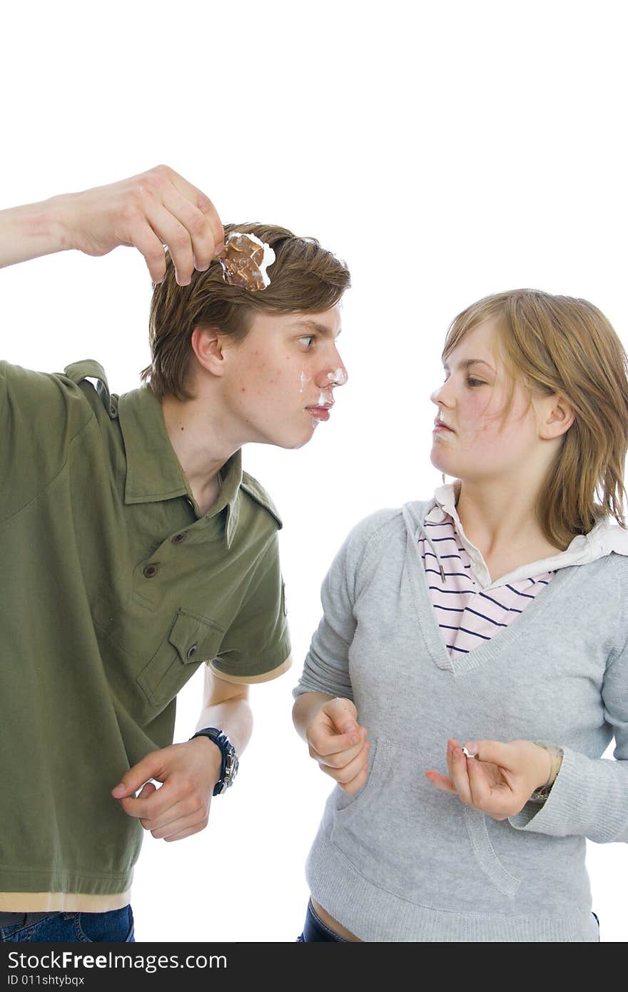 Young couple with ice-cream isolated on a white