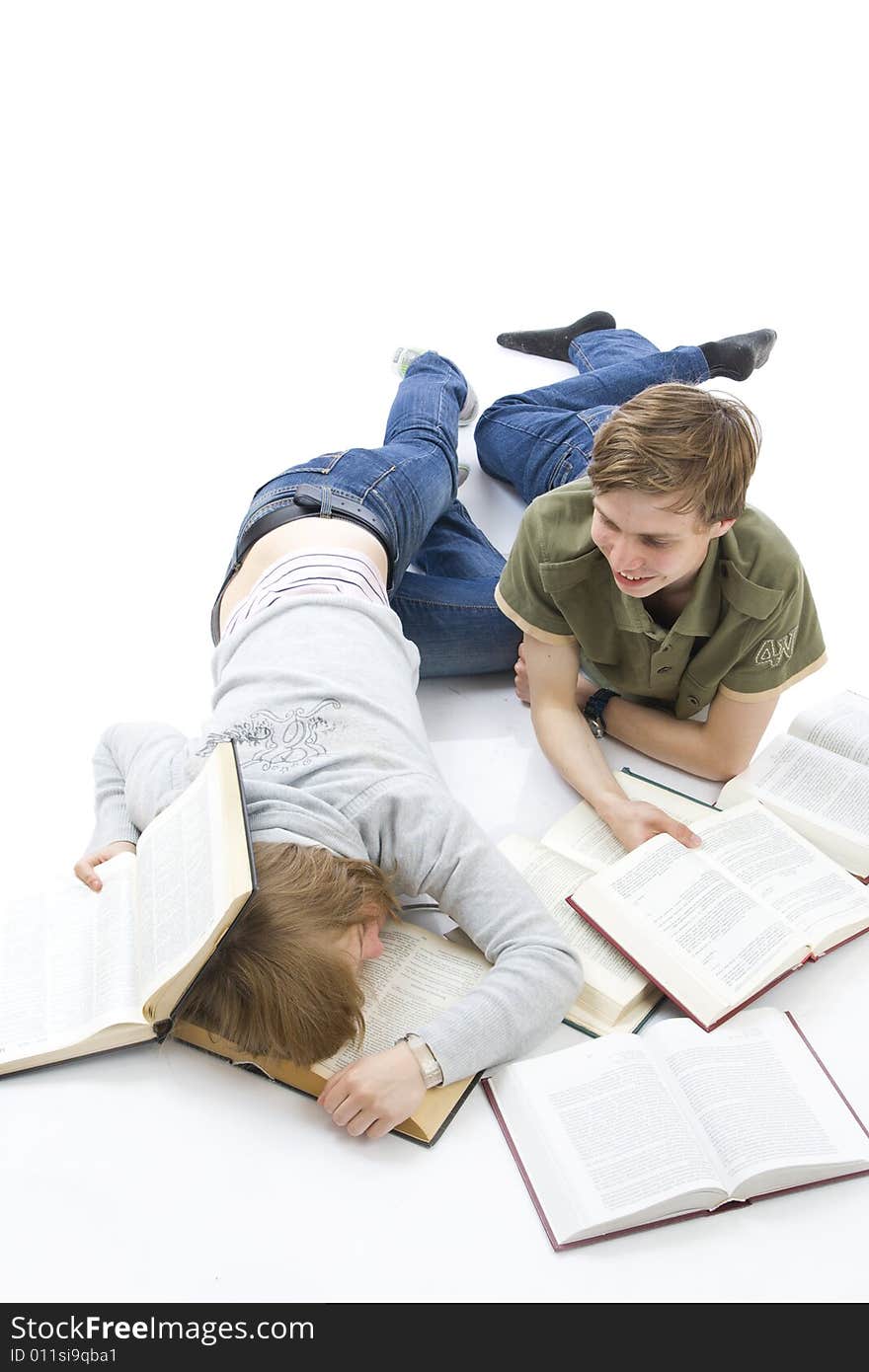 The two young students isolated on a white