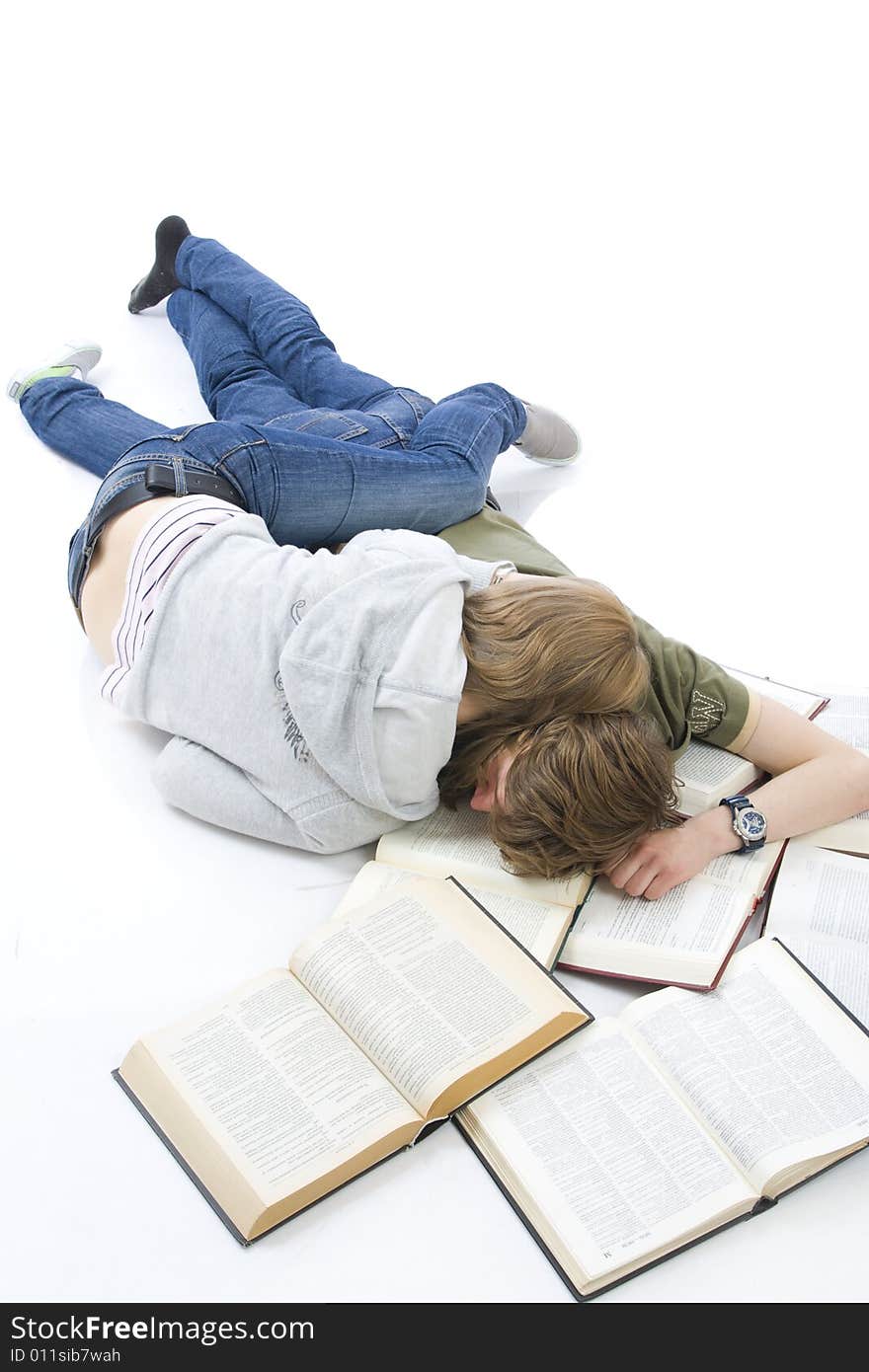 The two young students isolated on a white