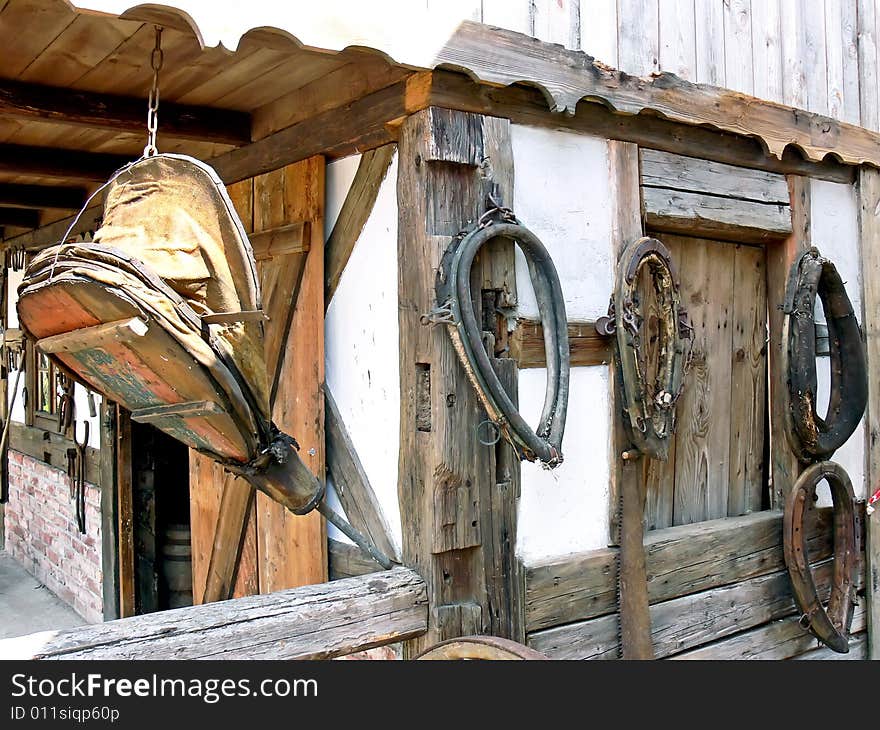 A view at the blacksmith workshop, tools and horse item. A view at the blacksmith workshop, tools and horse item.