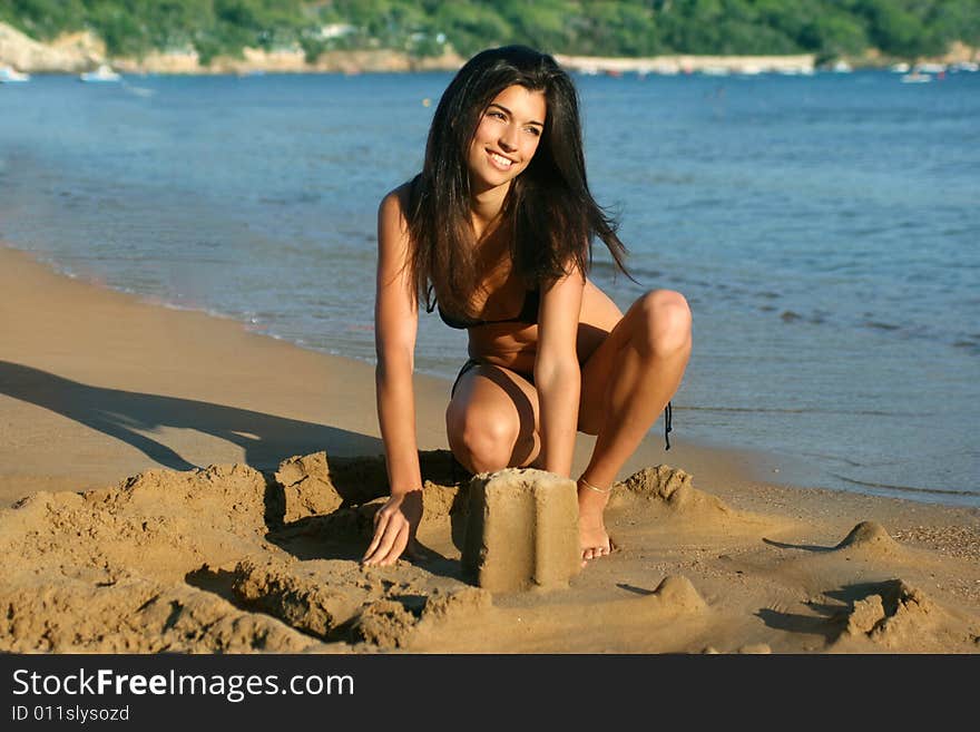 A beautiful woman on the beach. A beautiful woman on the beach