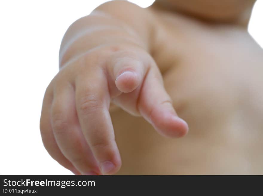 Close up view of young baby pointing finger on white back. Close up view of young baby pointing finger on white back