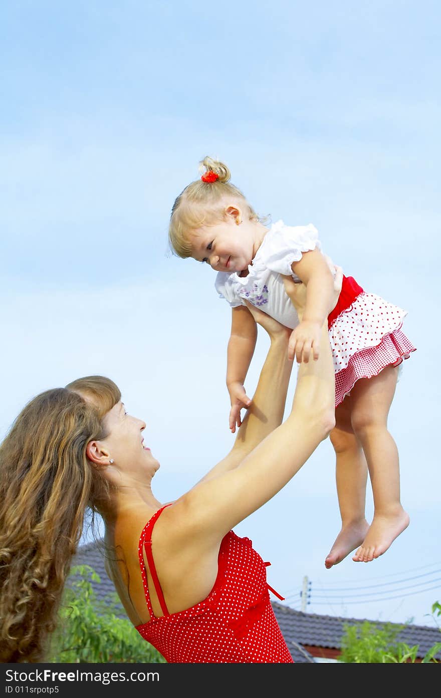 Portrait of young happy mother holding her  baby. Portrait of young happy mother holding her  baby