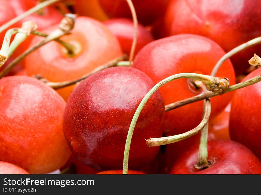 Fresh appetizing sweet cherry on a white background. Fresh appetizing sweet cherry on a white background