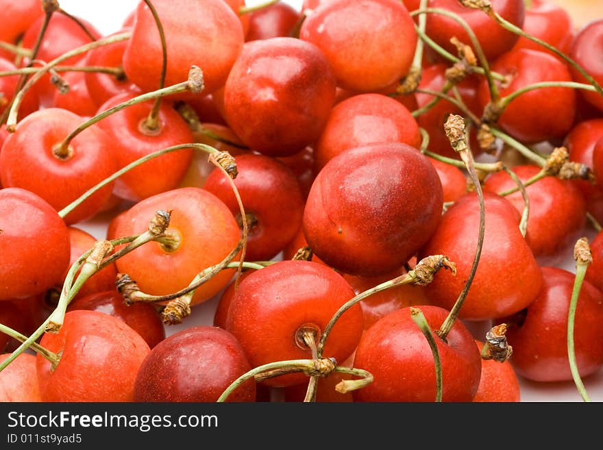 Fresh appetizing sweet cherry on a white background. Fresh appetizing sweet cherry on a white background