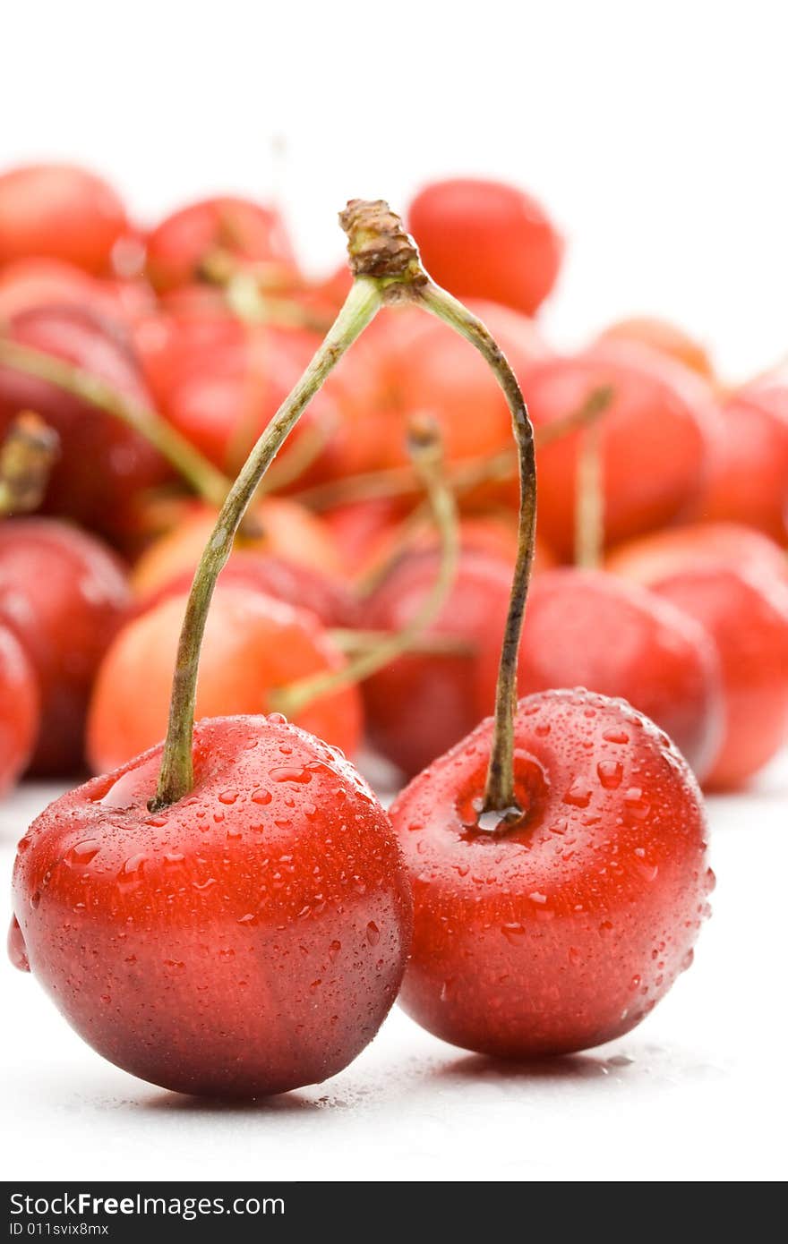 Fresh appetizing sweet cherry on a white background. Fresh appetizing sweet cherry on a white background