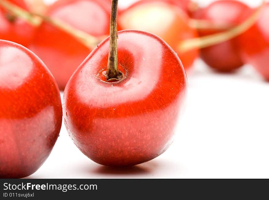 Fresh appetizing sweet cherry on a white background. Fresh appetizing sweet cherry on a white background