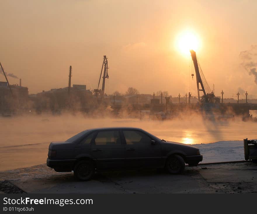 A car in a port in the evening