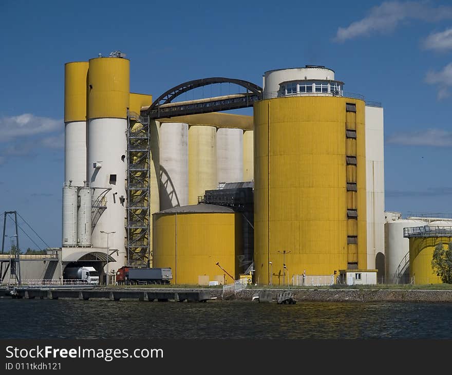 Elevators for malt and grain located beside port canal