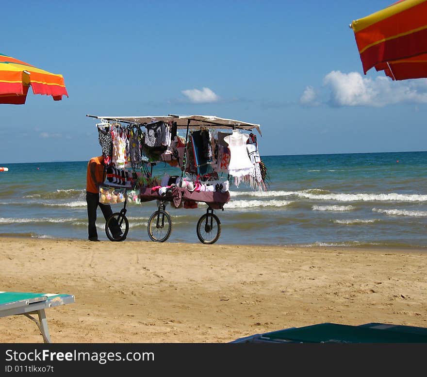 A vendor on the beach. A vendor on the beach