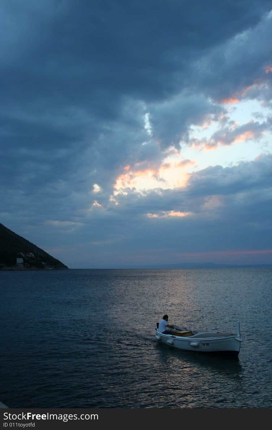 Fisherman coming back to harbor after fishing. Fisherman coming back to harbor after fishing.