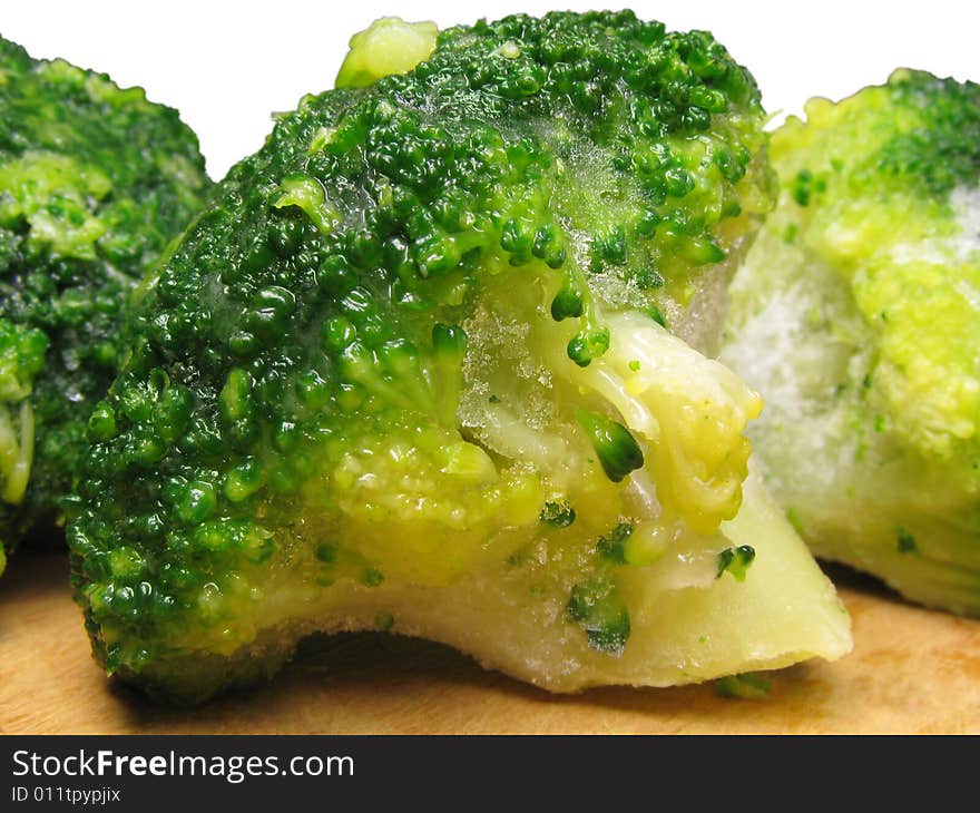 Quick-frozen broccoli with grains of ice. Quick-frozen broccoli with grains of ice