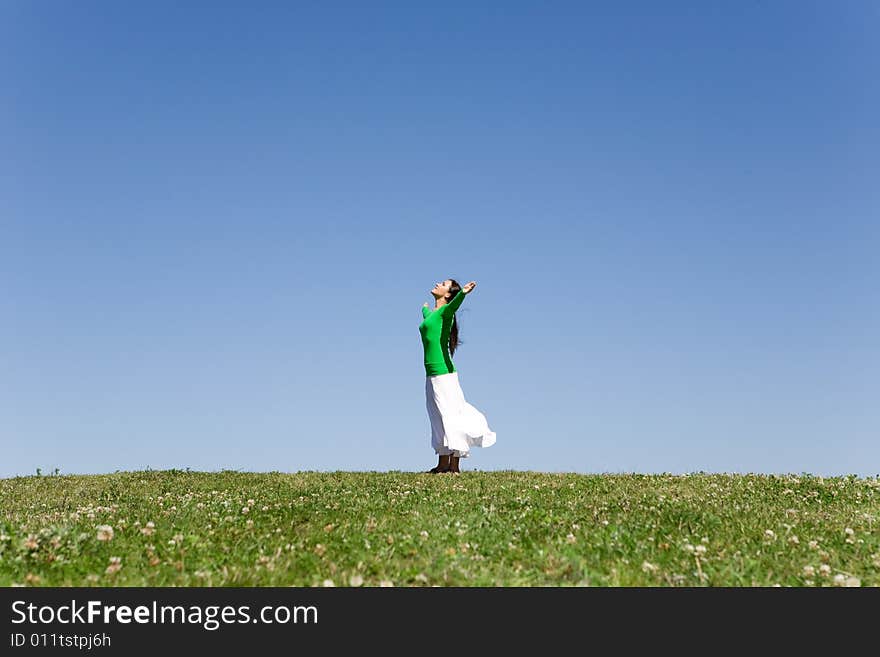 Happy woman relaxing on meadow. Happy woman relaxing on meadow