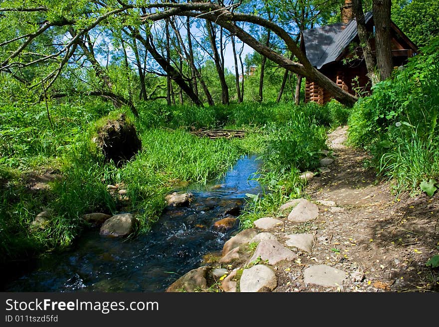 A wooden house on the bank