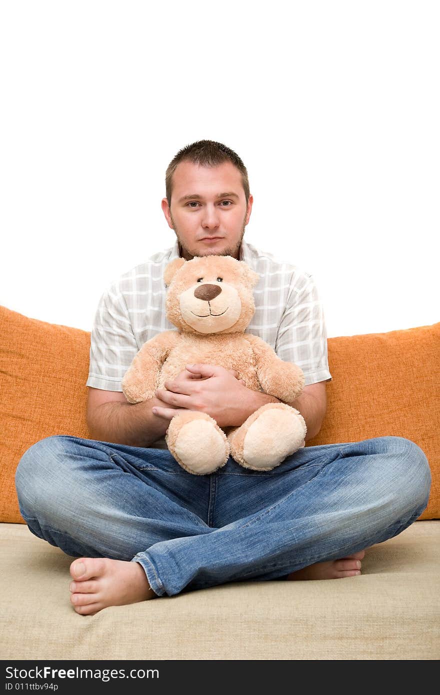 Happy man sitting on sofa. Happy man sitting on sofa