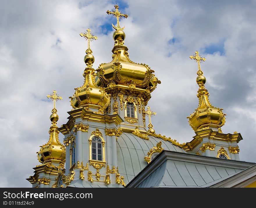 This beautiful golden church is situated in Petergof not far from St. Petersburg, Russia. It was built by the famous Russian architect (of Italian origin) Francesco Bartolomeo Rastrelli in 1747-1751. This beautiful golden church is situated in Petergof not far from St. Petersburg, Russia. It was built by the famous Russian architect (of Italian origin) Francesco Bartolomeo Rastrelli in 1747-1751