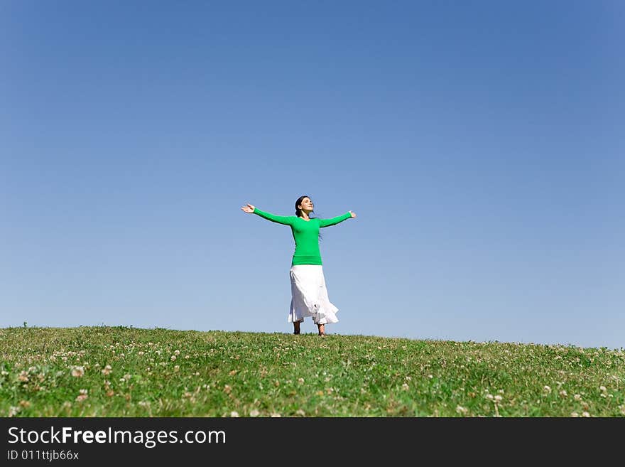 Happy woman relaxing on meadow. Happy woman relaxing on meadow