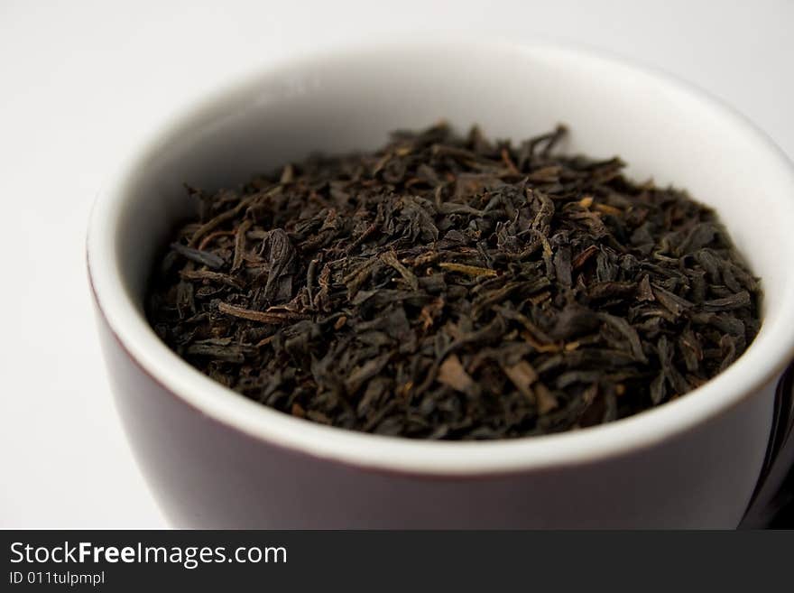 Tea leaves by cup