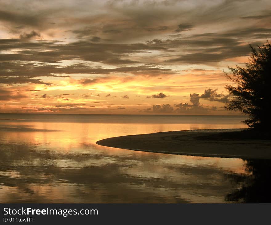 Sunset over calm water in antique tones. Sunset over calm water in antique tones