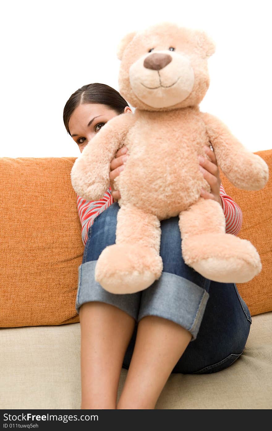 Happy brunette woman on sofa. Happy brunette woman on sofa