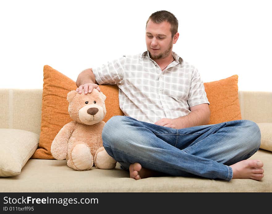 Happy man sitting on sofa. Happy man sitting on sofa