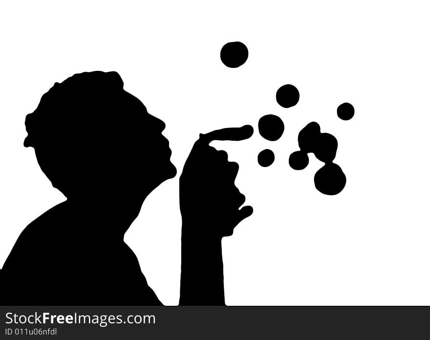 The silhouette of a teenager blowing bubbles