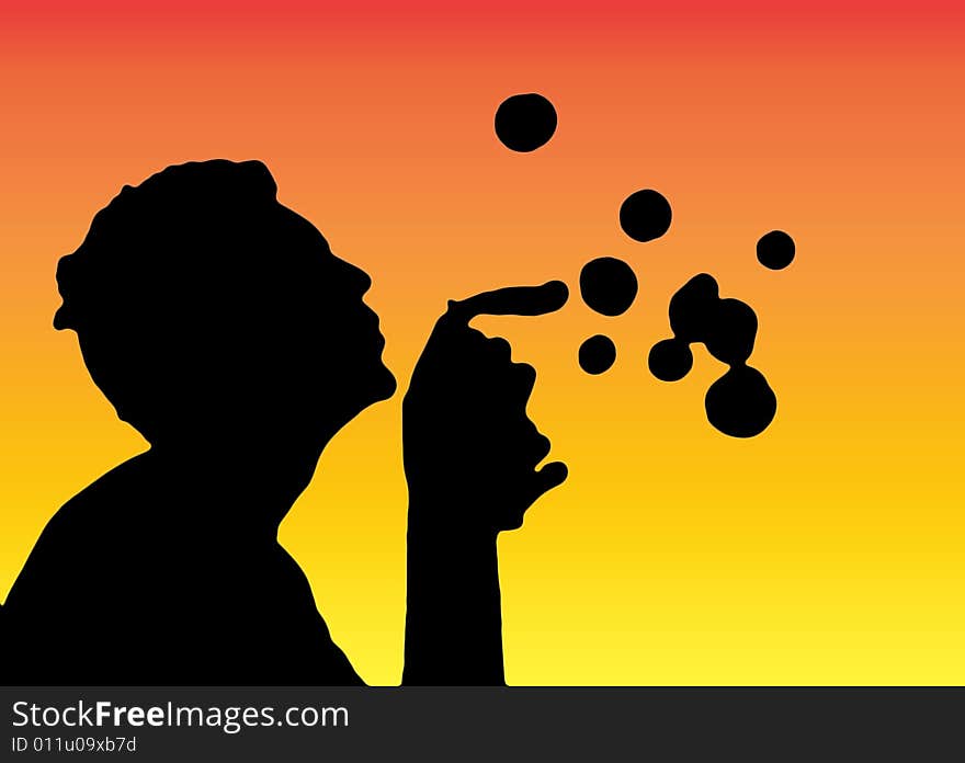 The silhouette of a teenager blowing bubbles