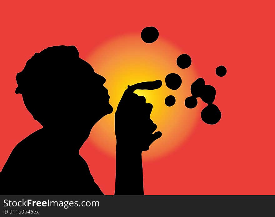 The silhouette of a teenager blowing bubbles