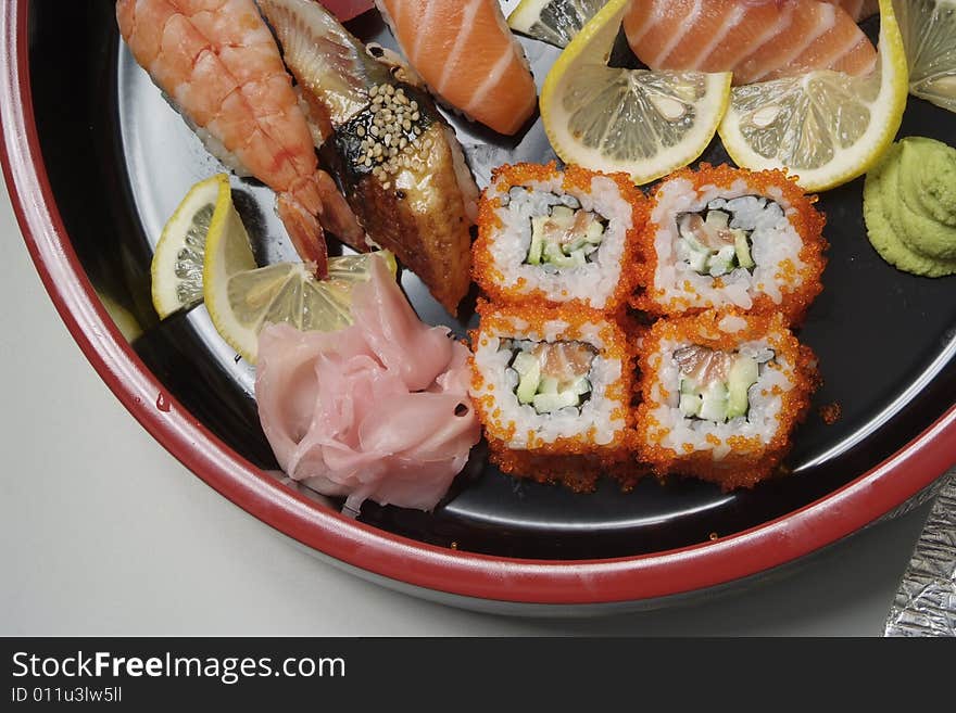 Sushi on round ceramic plate