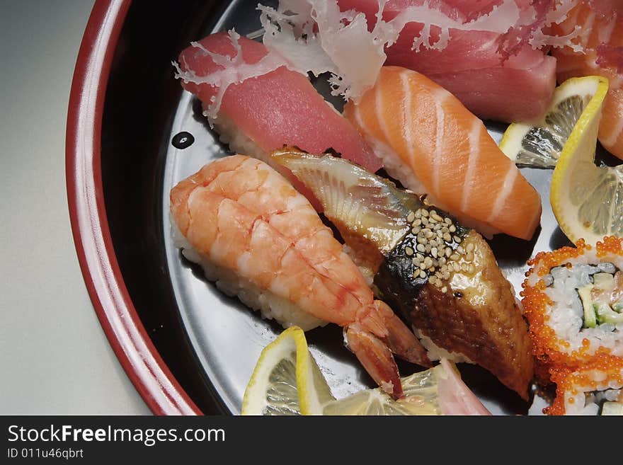 Sushi on round ceramic plate