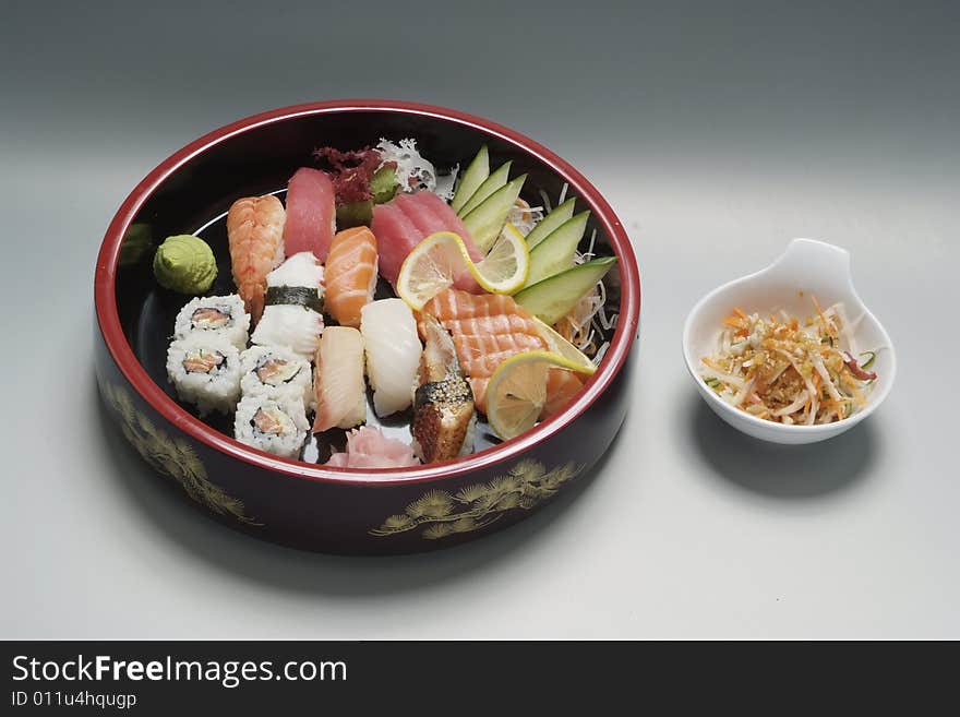 Sushi on round ceramic plate