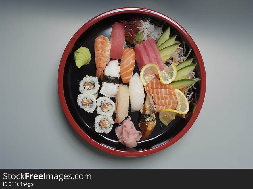 Sushi on round ceramic plate