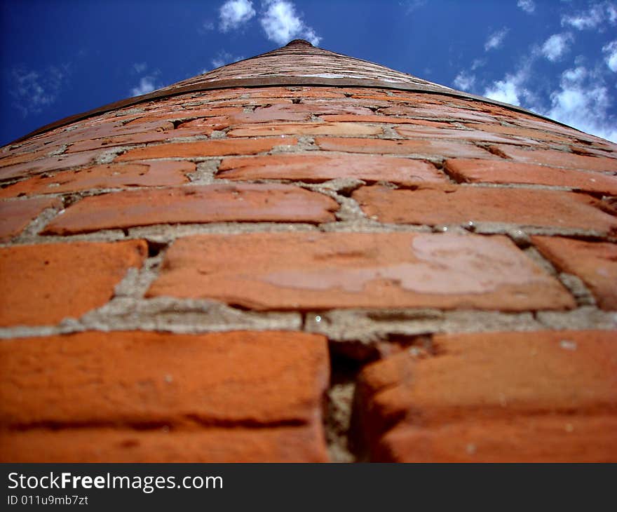 Old,  tall, factory brick tower