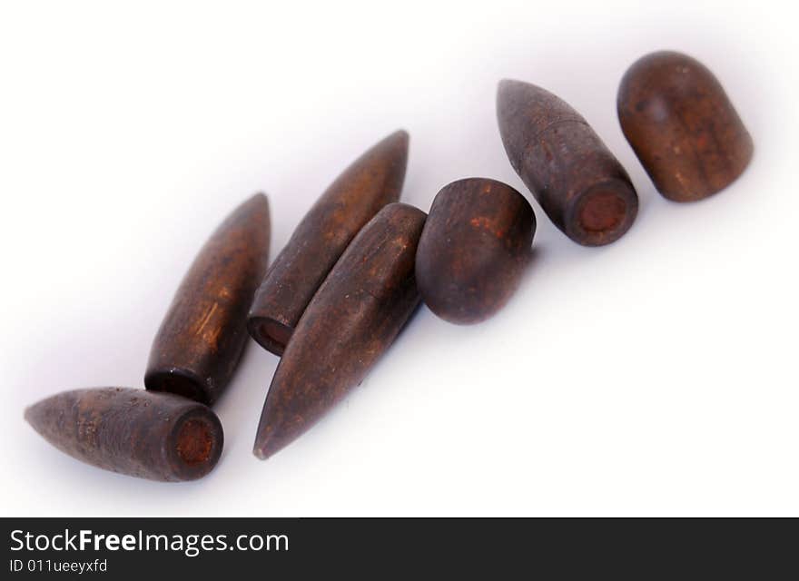 Macro set of old used 7,62 mm bullets of AK47 and of 9 mm TT isolated on white. Macro set of old used 7,62 mm bullets of AK47 and of 9 mm TT isolated on white