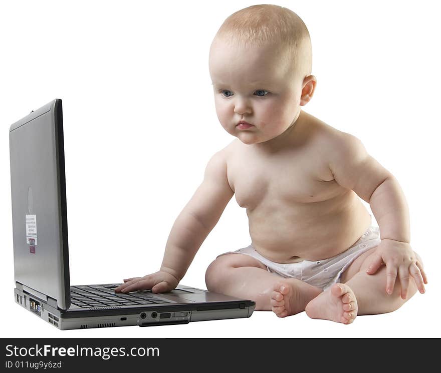 Baby Looking At Spread Sheet On Laptop.