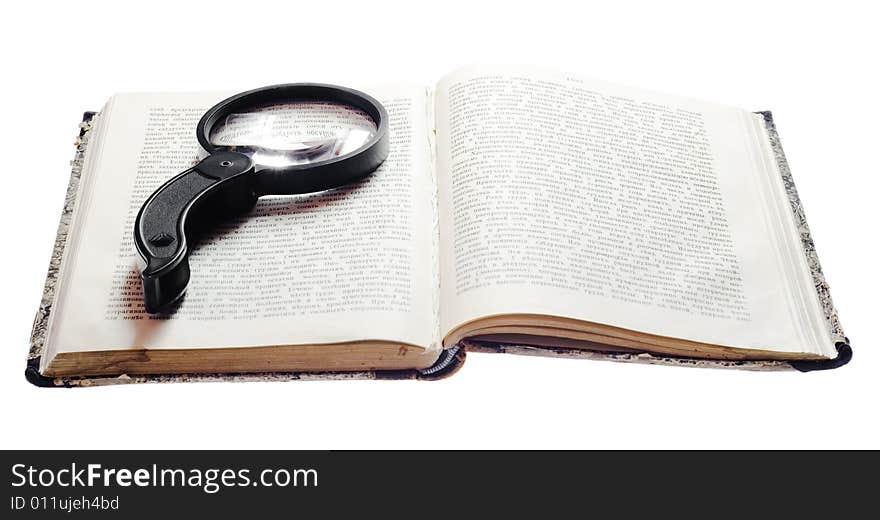 Magnifying Glass On Book