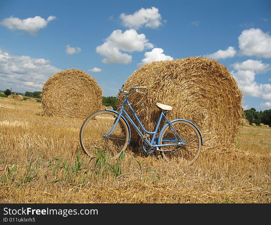 Classic retro bike with hay bales