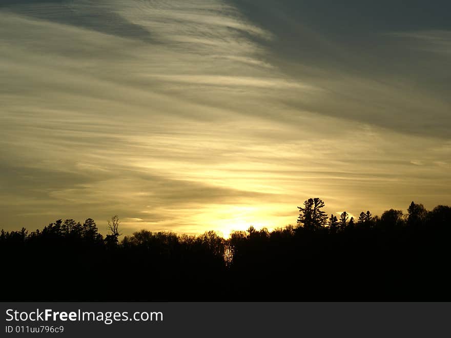 Late evening sunset with rolling clouds. Late evening sunset with rolling clouds