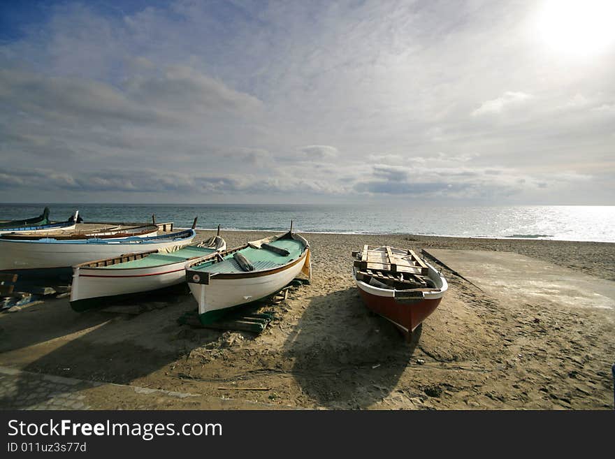 Some fishers' boats on a beach in Italy. Some fishers' boats on a beach in Italy