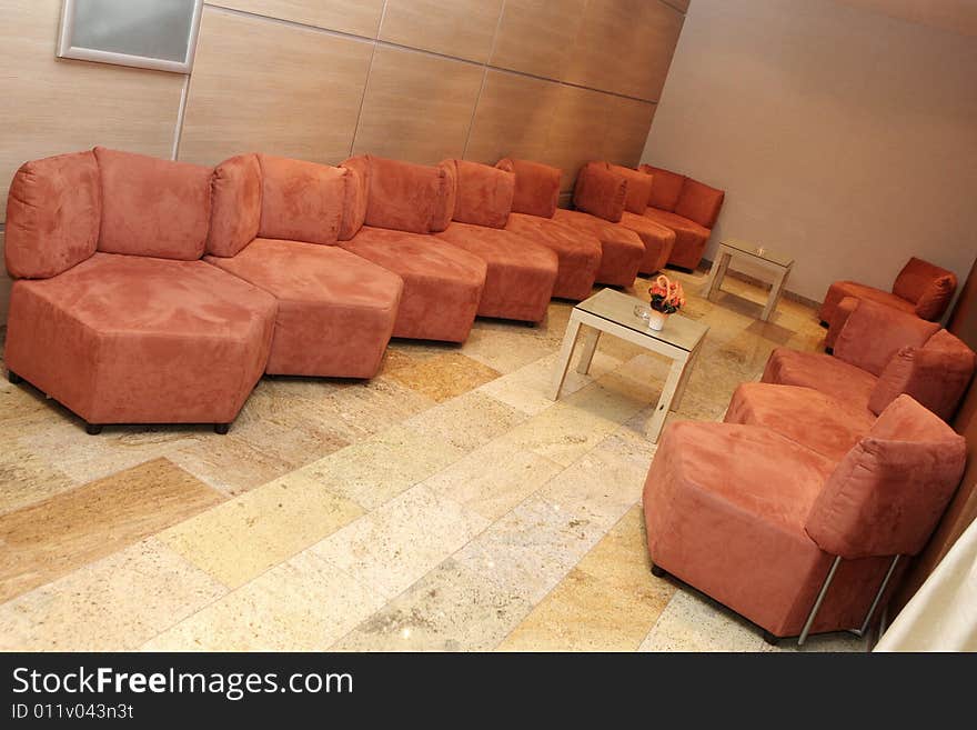 Many many armchairs in the room