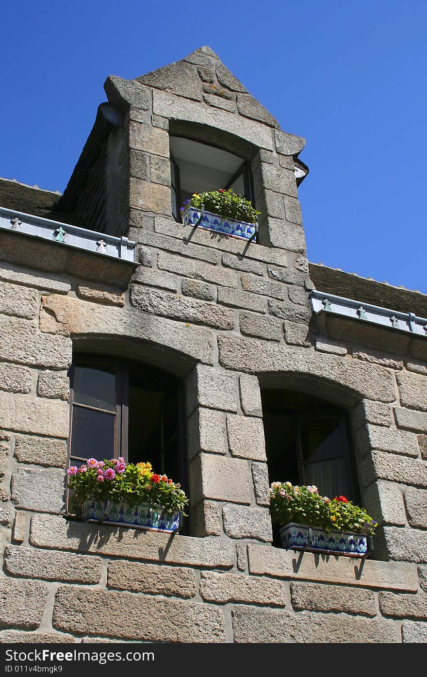 Windows in an old town in Bretagne