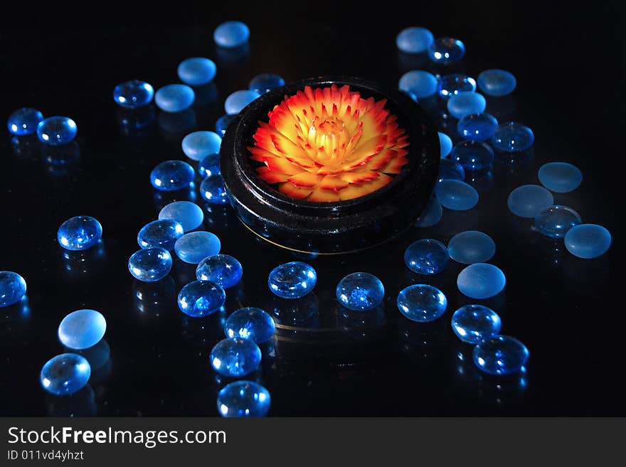 Candle lotus with blue marble. Candle lotus with blue marble