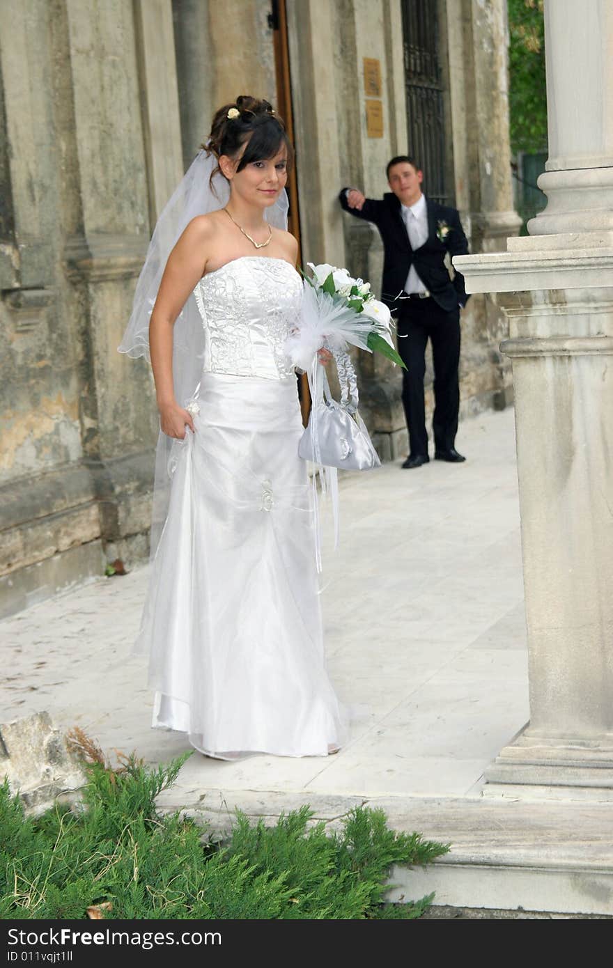 Beautiful bride and groom huging outdoor