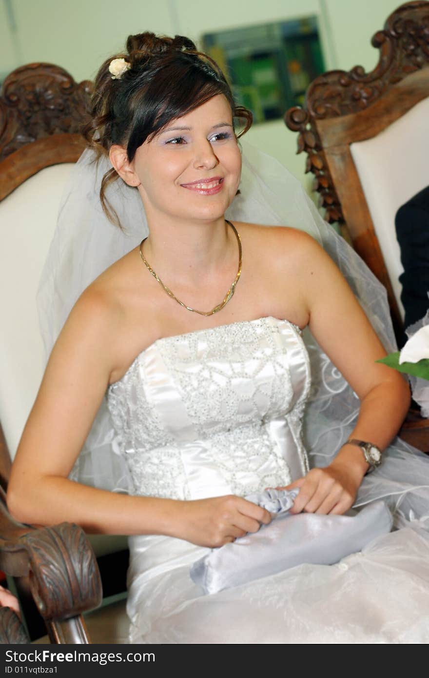 Beautiful bride sitting on chair