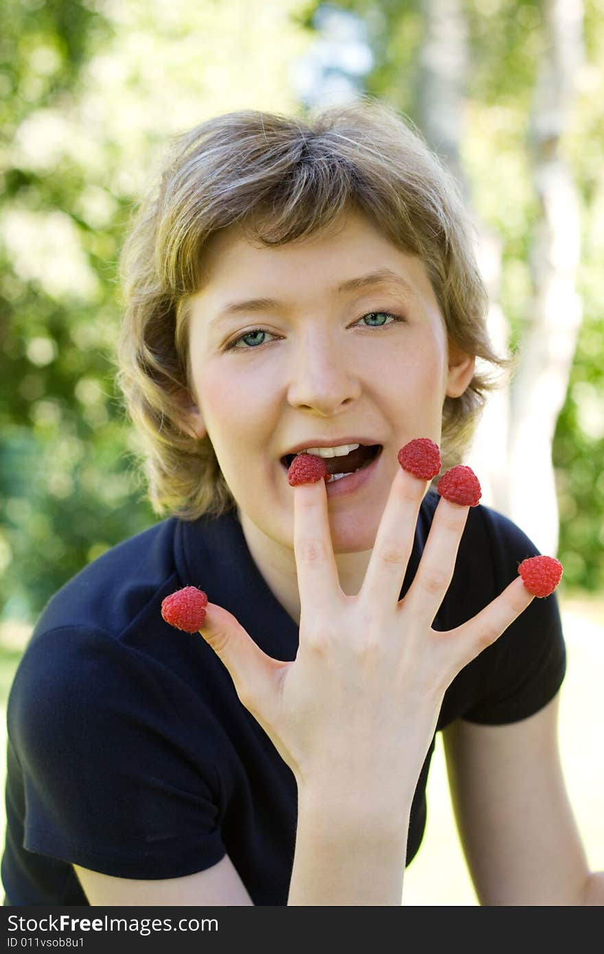 Woman with raspberries