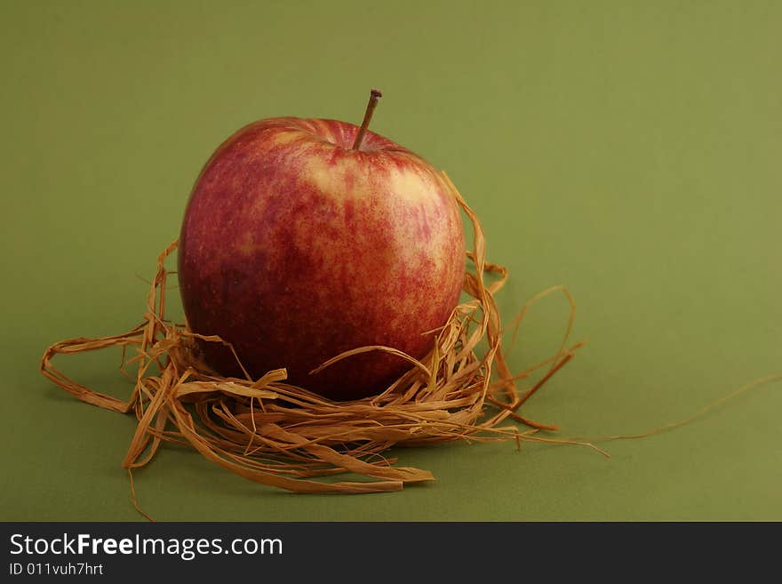 Apple in straw